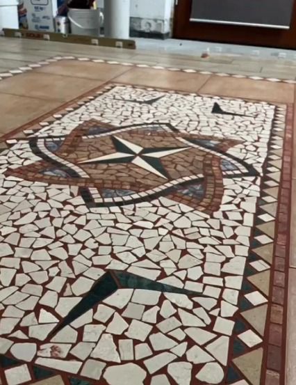 Pavimentazione con tappeto a mosaico